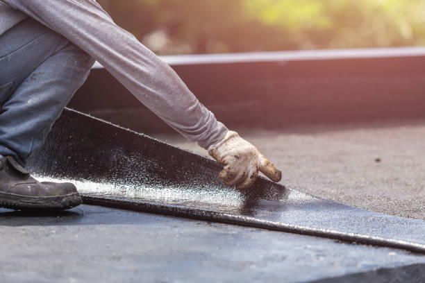 Professional Basement Waterproofing technician working in Woodland, WA
